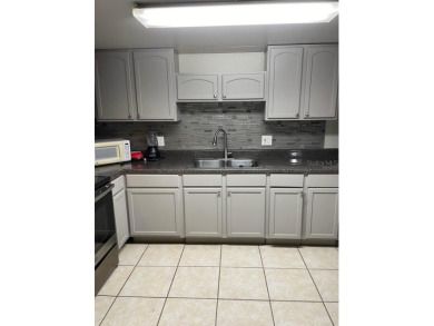 This beautifully updated 2-bedroom, 2-bath condo in Silver on Country Club At Silver Springs Shores in Florida - for sale on GolfHomes.com, golf home, golf lot