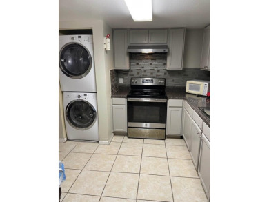 This beautifully updated 2-bedroom, 2-bath condo in Silver on Country Club At Silver Springs Shores in Florida - for sale on GolfHomes.com, golf home, golf lot
