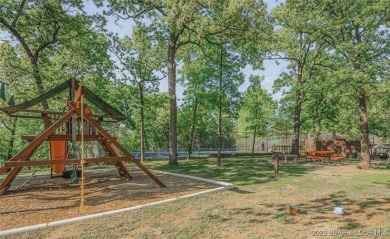 Welcome to your dream condo at Lake of the Ozarks! Its ready to on The Oaks Golf Course in Missouri - for sale on GolfHomes.com, golf home, golf lot