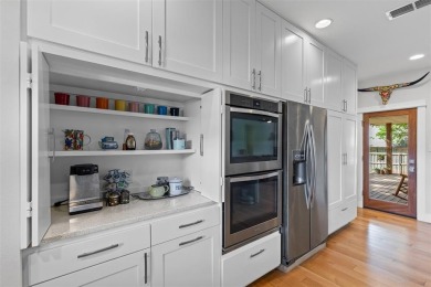 Welcome to this beautifully updated home with standout curb on De Cordova Bend Country Club in Texas - for sale on GolfHomes.com, golf home, golf lot