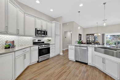 STUNNING 3/2 Designer BLOCK and STUCCO Gardenia with PAVER FRONT on Pennbrooke Fairways in Florida - for sale on GolfHomes.com, golf home, golf lot