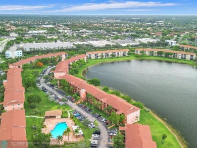 Bright & Clean first-floor 2-bedroom, 1.5-bathroom Waterfront on Flamingo Lakes Country Club in Florida - for sale on GolfHomes.com, golf home, golf lot