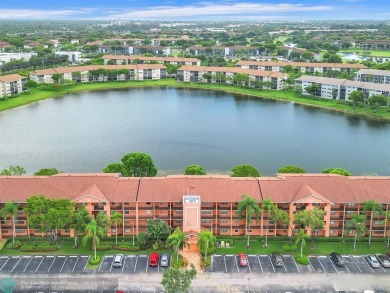 Bright & Clean first-floor 2-bedroom, 1.5-bathroom Waterfront on Flamingo Lakes Country Club in Florida - for sale on GolfHomes.com, golf home, golf lot