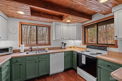 Tucked into the trees and perfectly positioned for privacy, The on Innsbrook Resort Golf Course in Missouri - for sale on GolfHomes.com, golf home, golf lot