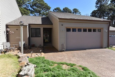 Experience the casual lifestyle of golf course living in this on Indian Hills Country Club in Arkansas - for sale on GolfHomes.com, golf home, golf lot