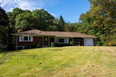 Sellers have made a serious price reduction to create a strong on Dudley Hill Golf Club in Massachusetts - for sale on GolfHomes.com, golf home, golf lot