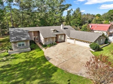 This golf course front 4-bedroom, 3.5-bathroom, 1-story brick on Rayburn Country Club in Texas - for sale on GolfHomes.com, golf home, golf lot