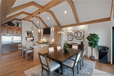 Dive into luxury at this breathtaking new build in Porto Cima on The Club At Porto Cima in Missouri - for sale on GolfHomes.com, golf home, golf lot