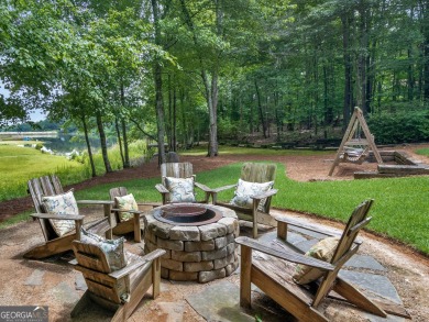 Welcome to 230 Shorewood Ct, nestled in a quiet cul-de-sac in on Canongate At Georgia National Golf Club in Georgia - for sale on GolfHomes.com, golf home, golf lot