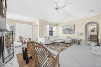 Nestled in the highly sought-after community of Pelican Bay on The Club At Pelican Bay - North Course in Florida - for sale on GolfHomes.com, golf home, golf lot
