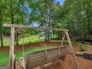 Welcome to 230 Shorewood Ct, nestled in a quiet cul-de-sac in on Canongate At Georgia National Golf Club in Georgia - for sale on GolfHomes.com, golf home, golf lot