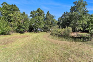 Nestled in a serene lakeside setting, this charming 3-bedroom on Turtle Creek Golf Club in Michigan - for sale on GolfHomes.com, golf home, golf lot