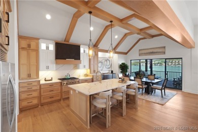 Dive into luxury at this breathtaking new build in Porto Cima on The Club At Porto Cima in Missouri - for sale on GolfHomes.com, golf home, golf lot