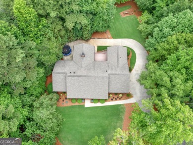 Welcome to 230 Shorewood Ct, nestled in a quiet cul-de-sac in on Canongate At Georgia National Golf Club in Georgia - for sale on GolfHomes.com, golf home, golf lot