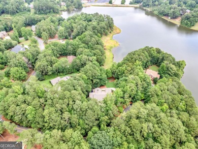 Welcome to 230 Shorewood Ct, nestled in a quiet cul-de-sac in on Canongate At Georgia National Golf Club in Georgia - for sale on GolfHomes.com, golf home, golf lot