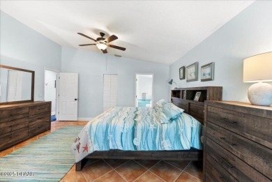 This golf community Florida Home is located on the 11th fairway on The Grand Club - Pine Lakes Course in Florida - for sale on GolfHomes.com, golf home, golf lot