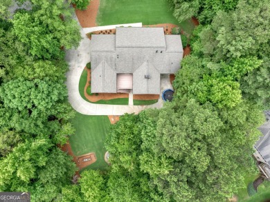 Welcome to 230 Shorewood Ct, nestled in a quiet cul-de-sac in on Canongate At Georgia National Golf Club in Georgia - for sale on GolfHomes.com, golf home, golf lot