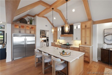 Dive into luxury at this breathtaking new build in Porto Cima on The Club At Porto Cima in Missouri - for sale on GolfHomes.com, golf home, golf lot