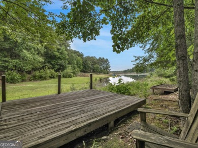 Welcome to 230 Shorewood Ct, nestled in a quiet cul-de-sac in on Canongate At Georgia National Golf Club in Georgia - for sale on GolfHomes.com, golf home, golf lot