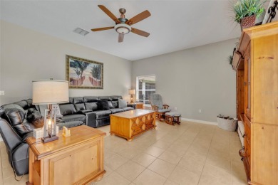 Beautifully situated within the gated North Shore at Lake Hart on North Shore Golf Club in Florida - for sale on GolfHomes.com, golf home, golf lot