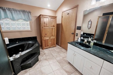 Awesome custom-built 1.5 story Lindal Cedar Home on wooded Golf on Holly Lake Ranch Golf Club in Texas - for sale on GolfHomes.com, golf home, golf lot
