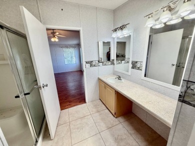 Home is located in Water Oak Country Club Estates an active 55 on Water Oak Country Club Estates in Florida - for sale on GolfHomes.com, golf home, golf lot