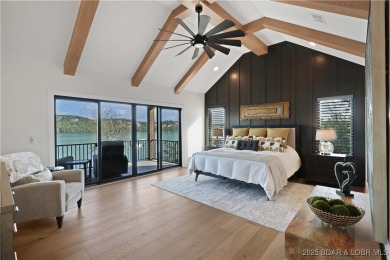 Dive into luxury at this breathtaking new build in Porto Cima on The Club At Porto Cima in Missouri - for sale on GolfHomes.com, golf home, golf lot