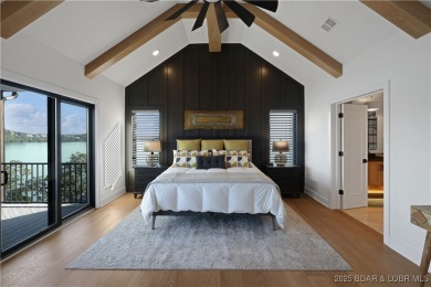 Dive into luxury at this breathtaking new build in Porto Cima on The Club At Porto Cima in Missouri - for sale on GolfHomes.com, golf home, golf lot