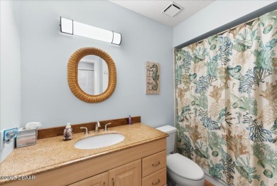 This golf community Florida Home is located on the 11th fairway on The Grand Club - Pine Lakes Course in Florida - for sale on GolfHomes.com, golf home, golf lot