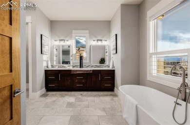 Tucked at the end of a tranquil cul-de-sac within the coveted on The Club At Flying Horse in Colorado - for sale on GolfHomes.com, golf home, golf lot
