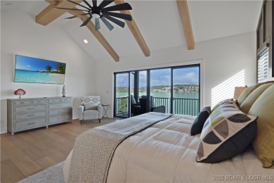 Dive into luxury at this breathtaking new build in Porto Cima on The Club At Porto Cima in Missouri - for sale on GolfHomes.com, golf home, golf lot