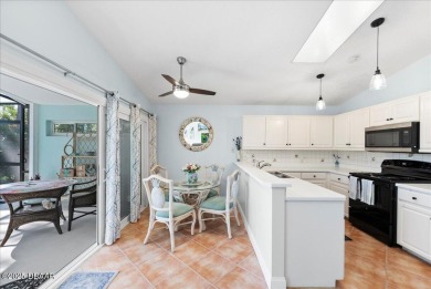This golf community Florida Home is located on the 11th fairway on The Grand Club - Pine Lakes Course in Florida - for sale on GolfHomes.com, golf home, golf lot
