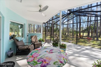 This golf community Florida Home is located on the 11th fairway on The Grand Club - Pine Lakes Course in Florida - for sale on GolfHomes.com, golf home, golf lot