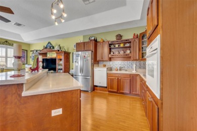 Beautifully situated within the gated North Shore at Lake Hart on North Shore Golf Club in Florida - for sale on GolfHomes.com, golf home, golf lot