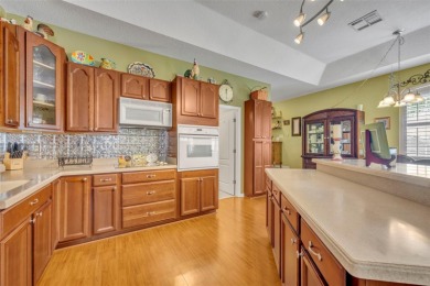 Beautifully situated within the gated North Shore at Lake Hart on North Shore Golf Club in Florida - for sale on GolfHomes.com, golf home, golf lot