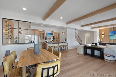 Dive into luxury at this breathtaking new build in Porto Cima on The Club At Porto Cima in Missouri - for sale on GolfHomes.com, golf home, golf lot