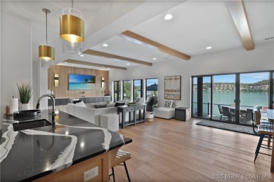 Dive into luxury at this breathtaking new build in Porto Cima on The Club At Porto Cima in Missouri - for sale on GolfHomes.com, golf home, golf lot