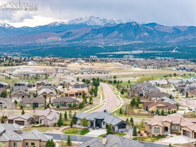 Tucked at the end of a tranquil cul-de-sac within the coveted on The Club At Flying Horse in Colorado - for sale on GolfHomes.com, golf home, golf lot