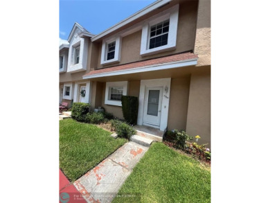 Spacious 3-Bedroom Townhome with Golf Course Views - West on Woodmont Country Club in Florida - for sale on GolfHomes.com, golf home, golf lot