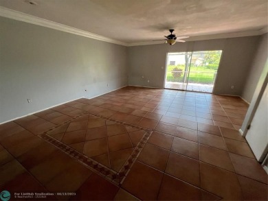 Spacious 3-Bedroom Townhome with Golf Course Views - West on Woodmont Country Club in Florida - for sale on GolfHomes.com, golf home, golf lot
