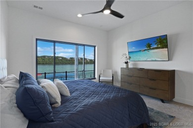 Dive into luxury at this breathtaking new build in Porto Cima on The Club At Porto Cima in Missouri - for sale on GolfHomes.com, golf home, golf lot