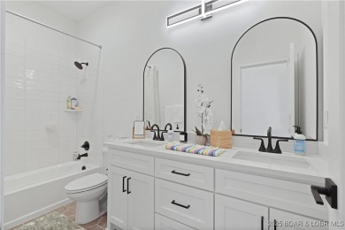 Dive into luxury at this breathtaking new build in Porto Cima on The Club At Porto Cima in Missouri - for sale on GolfHomes.com, golf home, golf lot