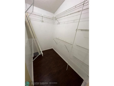 Spacious 3-Bedroom Townhome with Golf Course Views - West on Woodmont Country Club in Florida - for sale on GolfHomes.com, golf home, golf lot