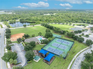 Beautifully situated within the gated North Shore at Lake Hart on North Shore Golf Club in Florida - for sale on GolfHomes.com, golf home, golf lot