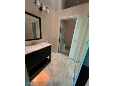 Spacious 3-Bedroom Townhome with Golf Course Views - West on Woodmont Country Club in Florida - for sale on GolfHomes.com, golf home, golf lot