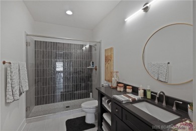 Dive into luxury at this breathtaking new build in Porto Cima on The Club At Porto Cima in Missouri - for sale on GolfHomes.com, golf home, golf lot