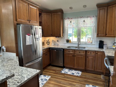 Beautifully remodeled home with panoramic views of the mountains on Dandridge Golf and Country Club in Tennessee - for sale on GolfHomes.com, golf home, golf lot