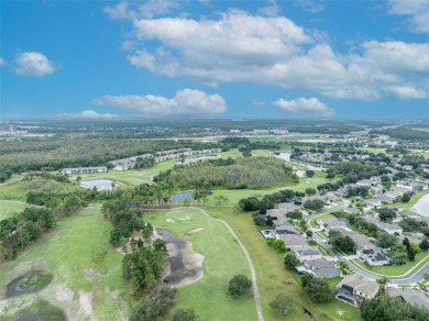 Beautifully situated within the gated North Shore at Lake Hart on North Shore Golf Club in Florida - for sale on GolfHomes.com, golf home, golf lot