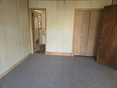 This wonderful 3 bedroom, 2 bath Cherokee Village home sits in a on Cherokee Village North Course in Arkansas - for sale on GolfHomes.com, golf home, golf lot