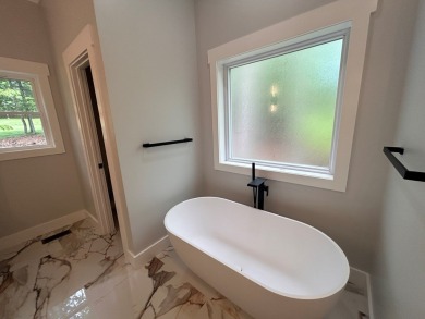New construction! This 4 bedroom/3.5 bath home has a view of the on Glade Springs Resort Golf Course in West Virginia - for sale on GolfHomes.com, golf home, golf lot